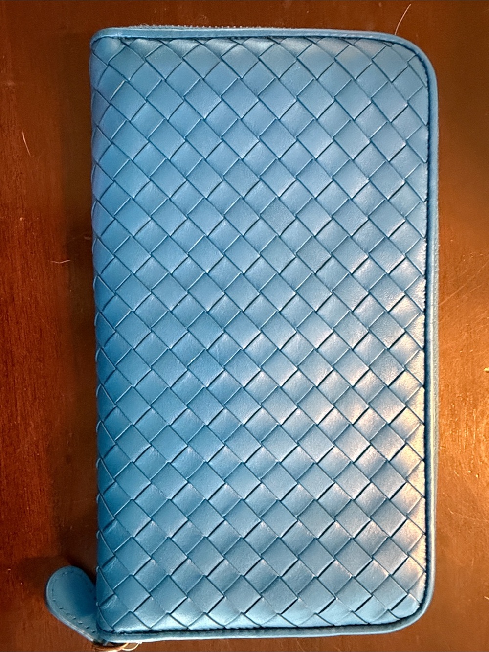 Authentic Bottega Veneta Leather Zip Around Wallet in Vibrant Blue